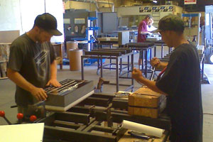 Robert and Kevin - Preparing markers for shipment
